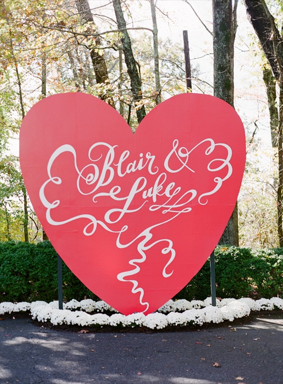 ceremony backdrops - giant red heart with names in calligraphy