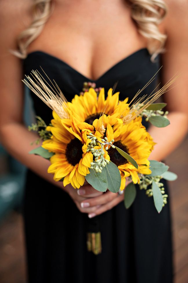sunflower wedding bouquets to inspire you. Don’t be afraid to carry an entire bouquet of these gorgeous blooms… they go with everything