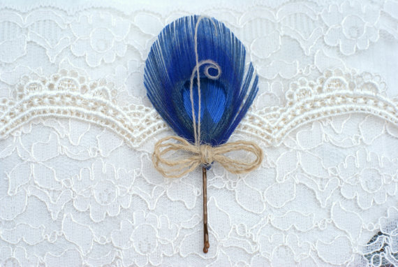 feather hair accessory in blue