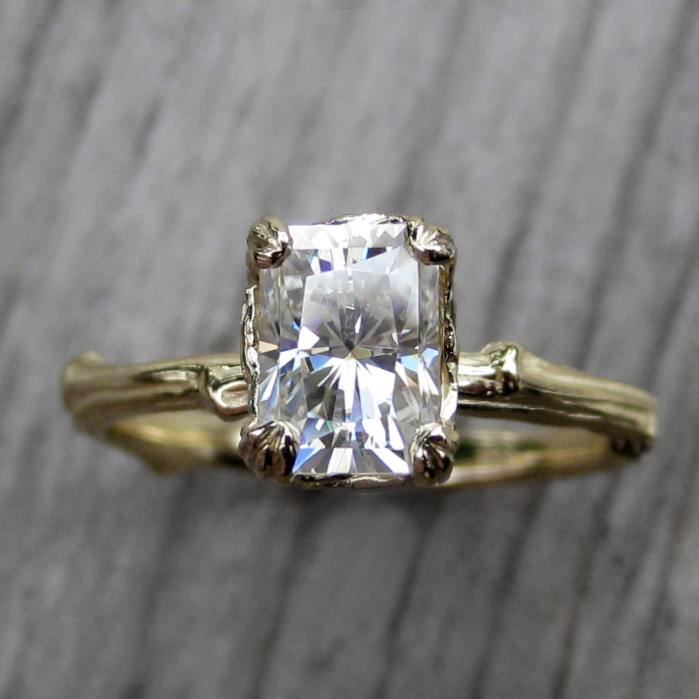 moissanite twig engagement ring with carved floral setting