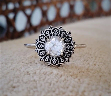 antique inspired ornate engagement ring