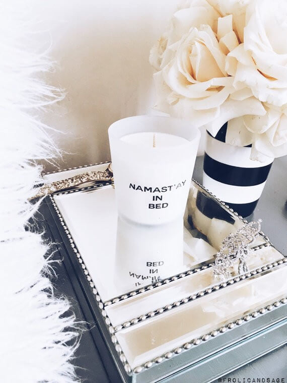 namaste in bed candle | bridesmaid yoga pants, tank tops, gifts & more | https://emmalinebride.com/gifts/bridesmaid-yoga-pants-gifts/