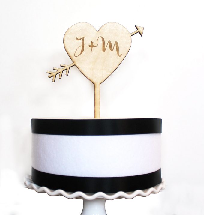 heart and arrow cake topper | via Heart and Arrow Wedding Ideas: https://emmalinebride.com/themes/heart-and-arrow-wedding-ideas