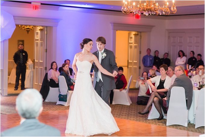 bride and groom dance at this Sedgefield Country Club wedding| Greensboro, North Carolina winter wedding photographed by Michelle Robinson Photography - https://emmalinebride.com/real-weddings/sedgefield-country-club-wedding/