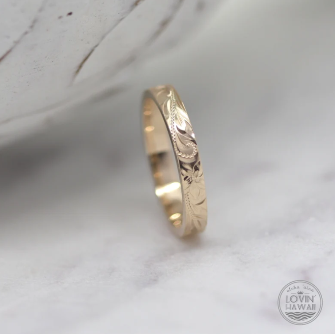 thin gold ring with hawaiian wedding ring