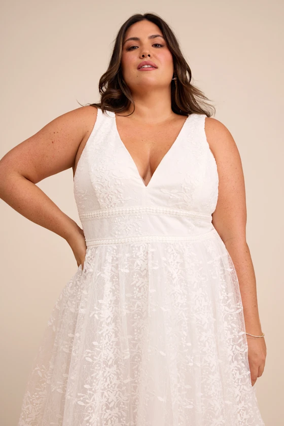 flowy white bridal shower dress 19 Bridal Shower Outfits For the Bride: Bows, Blue Floral & More