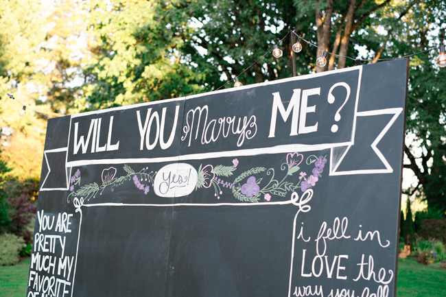 will you marry me chalk board sign| Photo: White Ivory Photography | via https://emmalinebride.com/real-weddings/hipster-engagement-session-what-does-one-look-like/