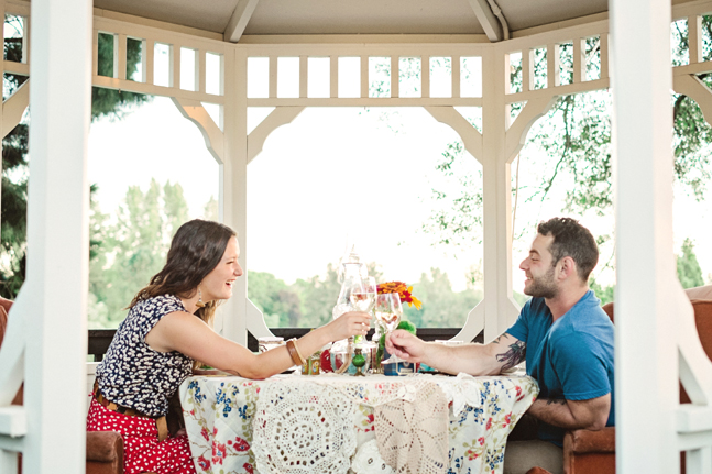 couple picnic pavilion| Photo: White Ivory Photography | via https://emmalinebride.com/real-weddings/hipster-engagement-session-what-does-one-look-like/