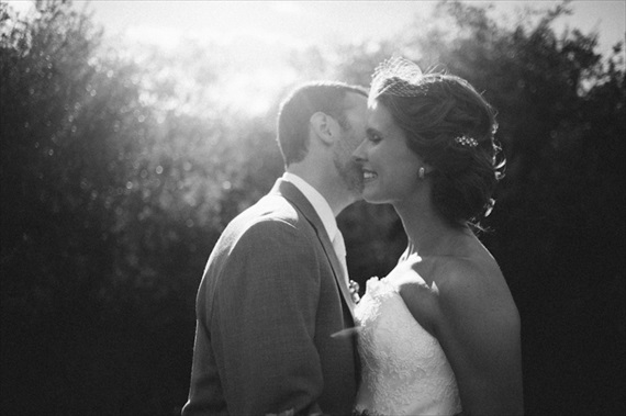 beautiful light groom kissing bride via 32 Secrets Wedding Photographers Wish You Knew