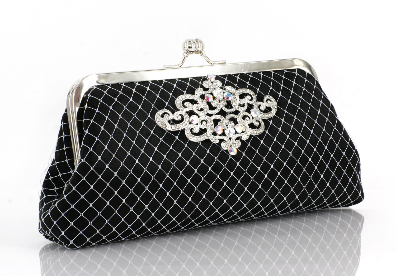black and white clutch by angee w with rhinestone brooch