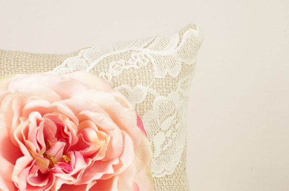 burlap ring pillow closeup of pink flower
