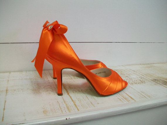hot orange heels via 30 Amazing Halloween Wedding Ideas from EmmalineBride.com