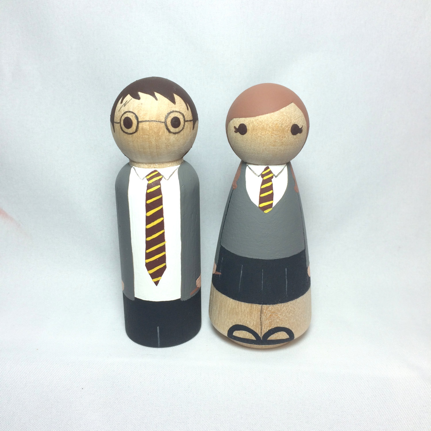 harry potter cake toppers | via emmalinebride.com | 50+ Greatest Geeky Wedding Ideas of All Time
