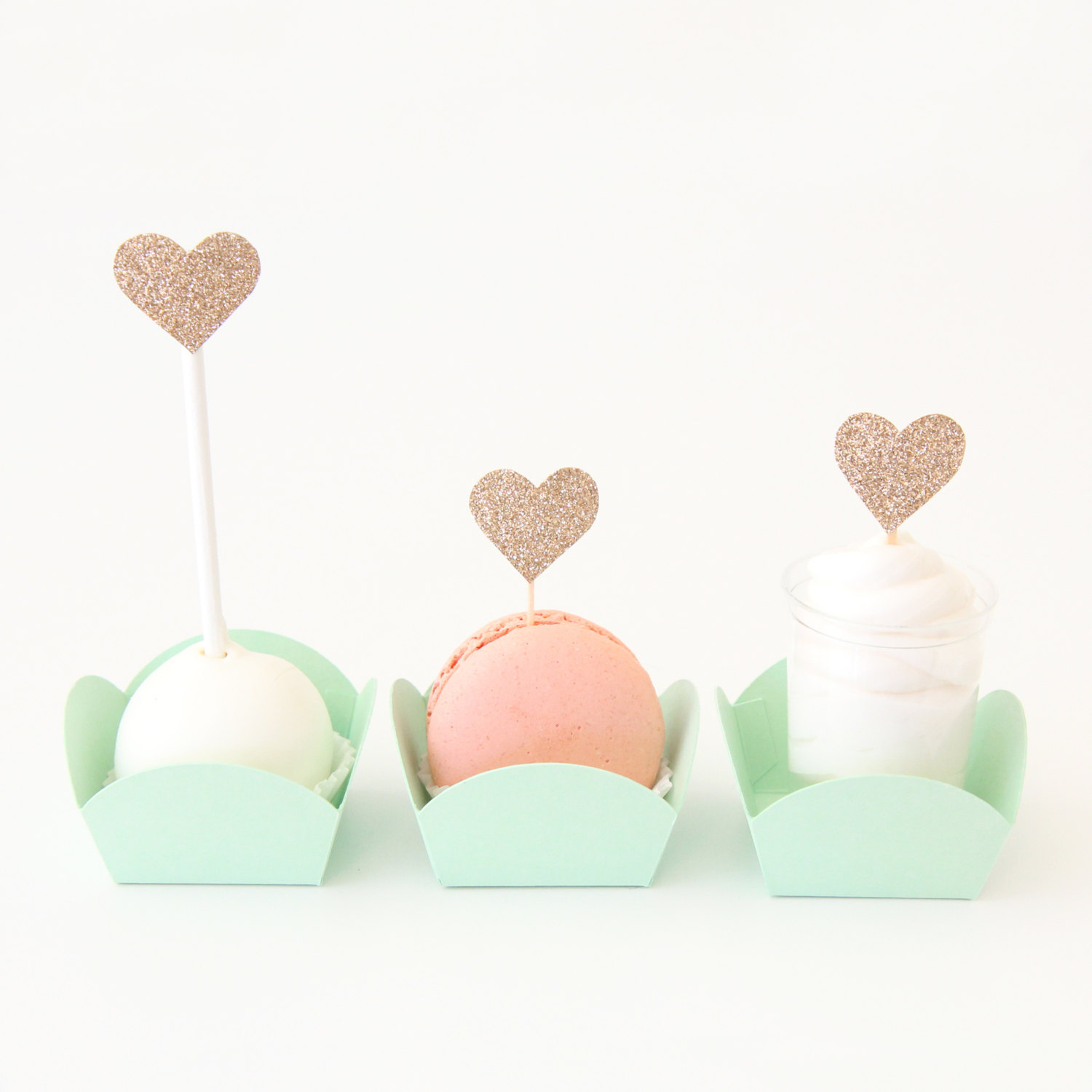 macarons in mint boxes | via 7 Things to Know About Giving Macaron Favors https://emmalinebride.com/favors/giving-macaron-favors/