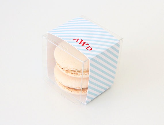 blue and write striped monogram favor box for macarons | via http://emmalinebride.com/favors/giving-macaron-favors/