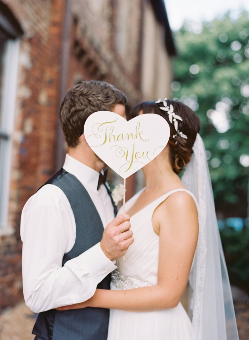 thank you photo prop bride and groom | Fun Wedding Photo Props | https://emmalinebride.com/decor/fun-wedding-photo-props/
