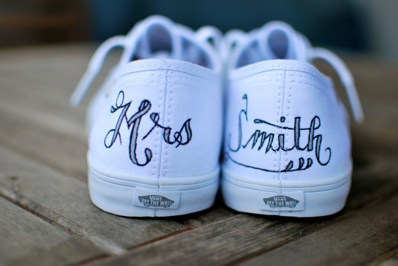 These custom VANS are hand-painted with your new name on the back. Cool idea! | via 31 Best Handmade Wedding Shoes https://emmalinebride.com/bride/handmade-wedding-shoes/
